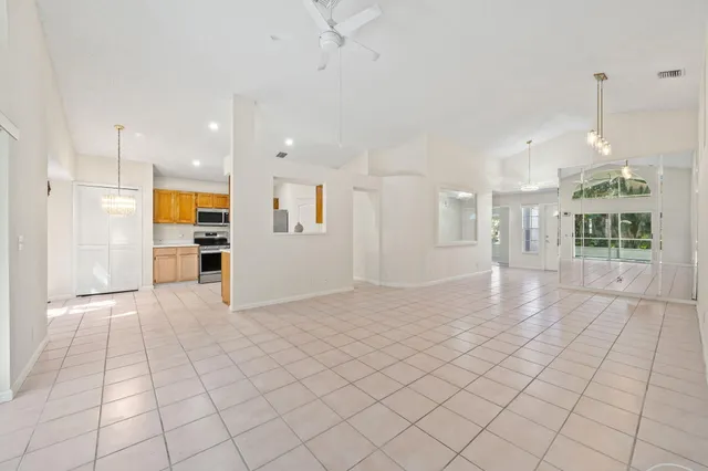 a view of a hallway with white walls