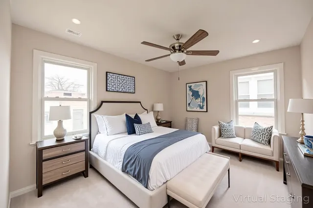 a bedroom with a bed and a couch