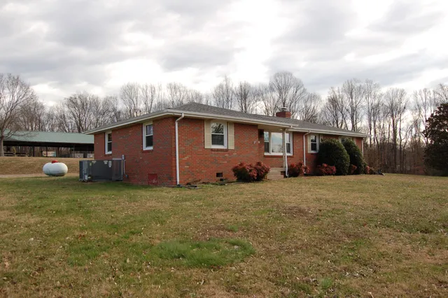 a backyard of a house with lots of green space