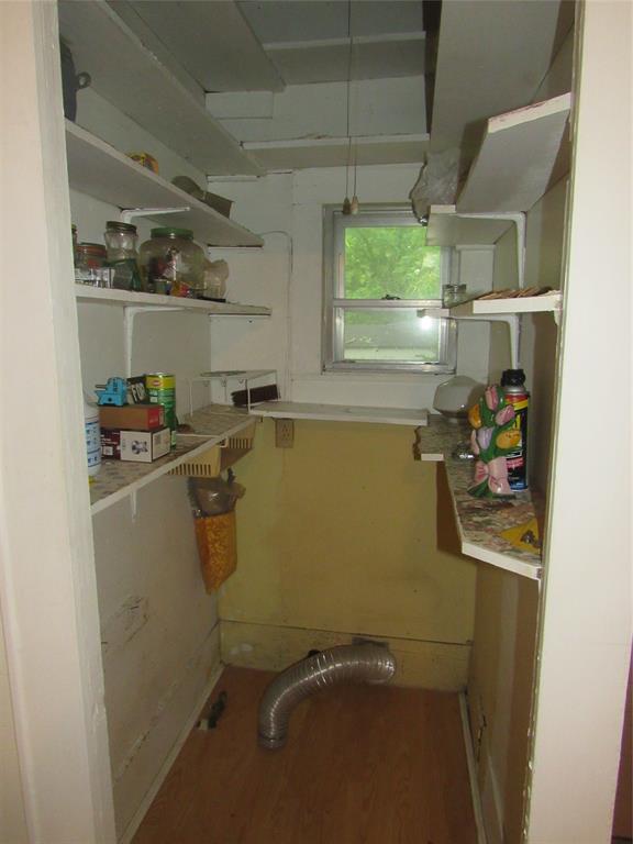 101 East Murray Street Denison, TX 75021 - Photo 17 of 32 a room with storage and utility