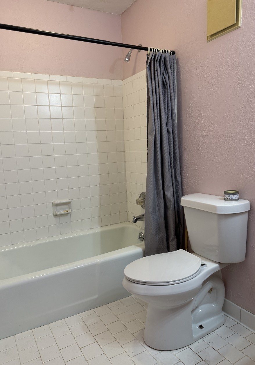 21 Vaughns Gap Road, Unit 146 Nashville, TN 37205 - Photo 9 of 14 a white toilet sitting next to a bath tub and a shower