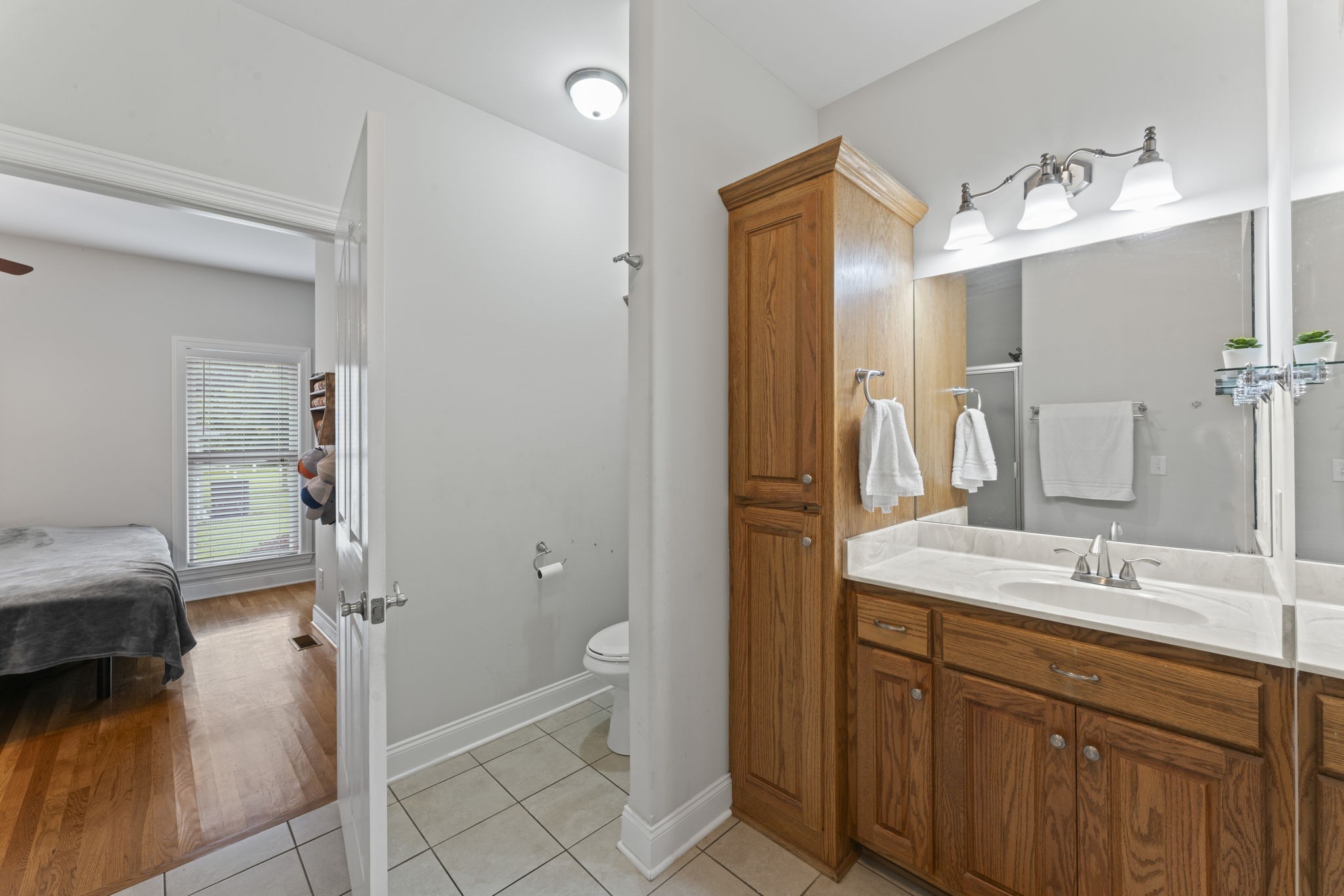 11237 Newtown Road Unionville, TN 37180 - Photo 12 of 46 a spacious bathroom with a sink double vanity and a mirror