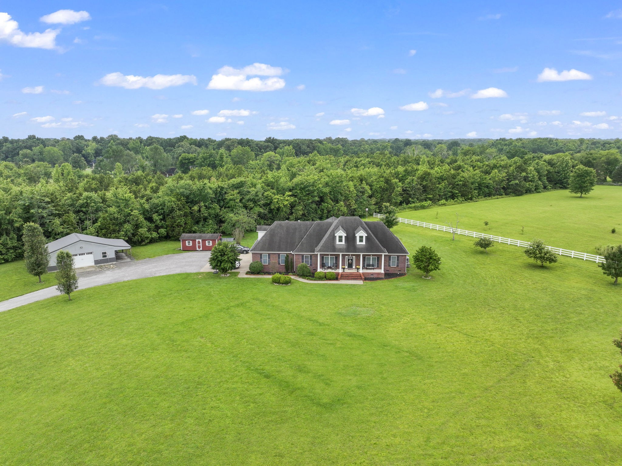 11237 Newtown Road Unionville, TN 37180 - Photo 2 of 46 a view of a garden with an outdoor space