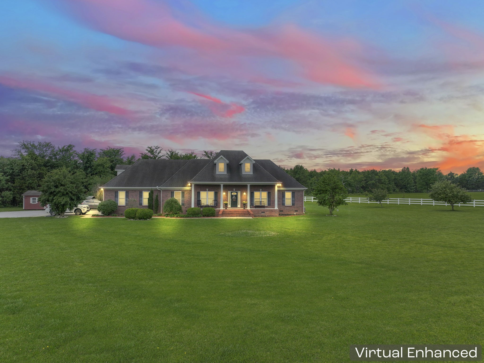 11237 Newtown Road Unionville, TN 37180 - Photo 3 of 46 a front view of a house with a garden