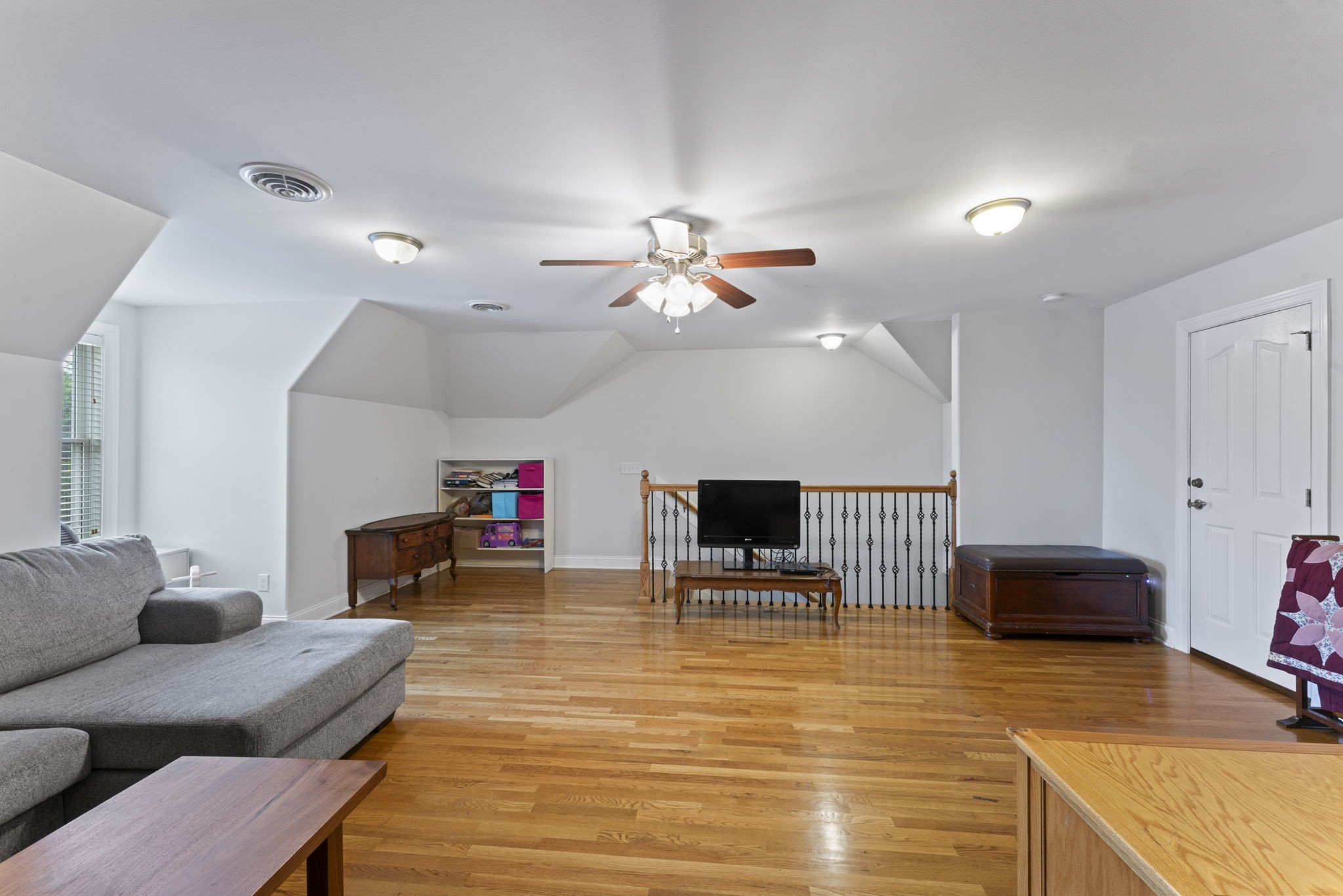 11237 Newtown Road Unionville, TN 37180 - Photo 31 of 46 a living room with furniture and a wooden floor
