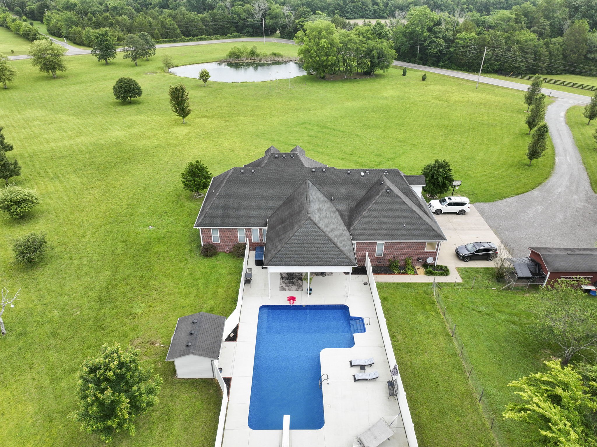 11237 Newtown Road Unionville, TN 37180 - Photo 42 of 46 an aerial view of a house with a garden