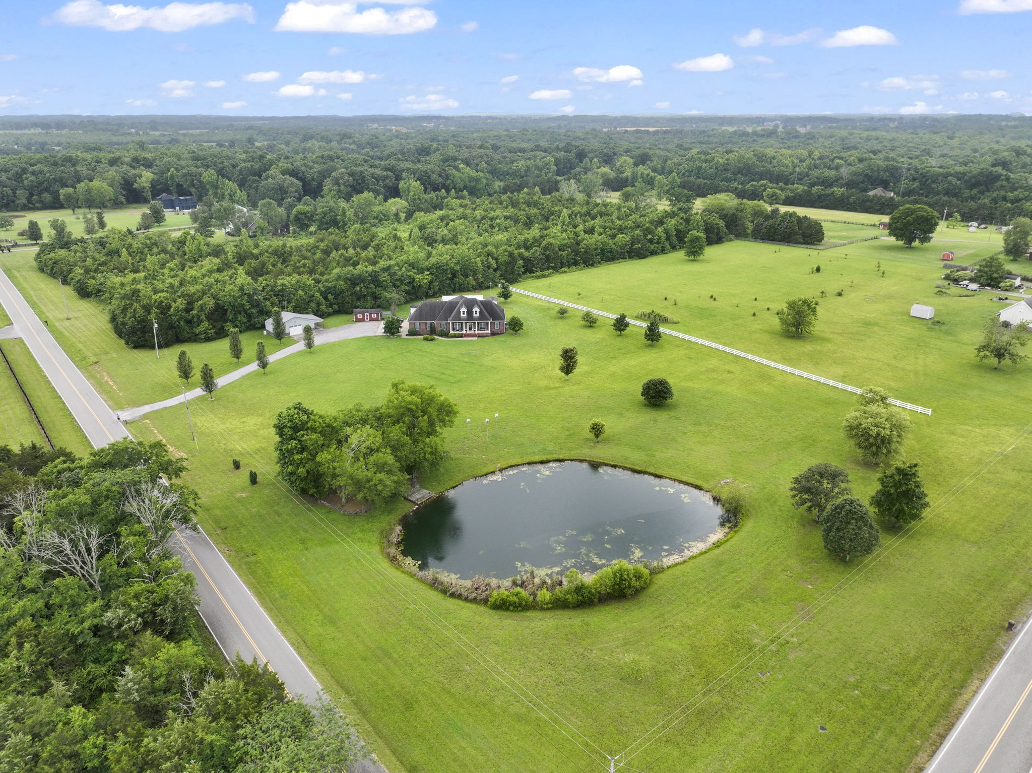 11237 Newtown Road Unionville, TN 37180 - Photo 43 of 46 a view of a swimming pool with a yard