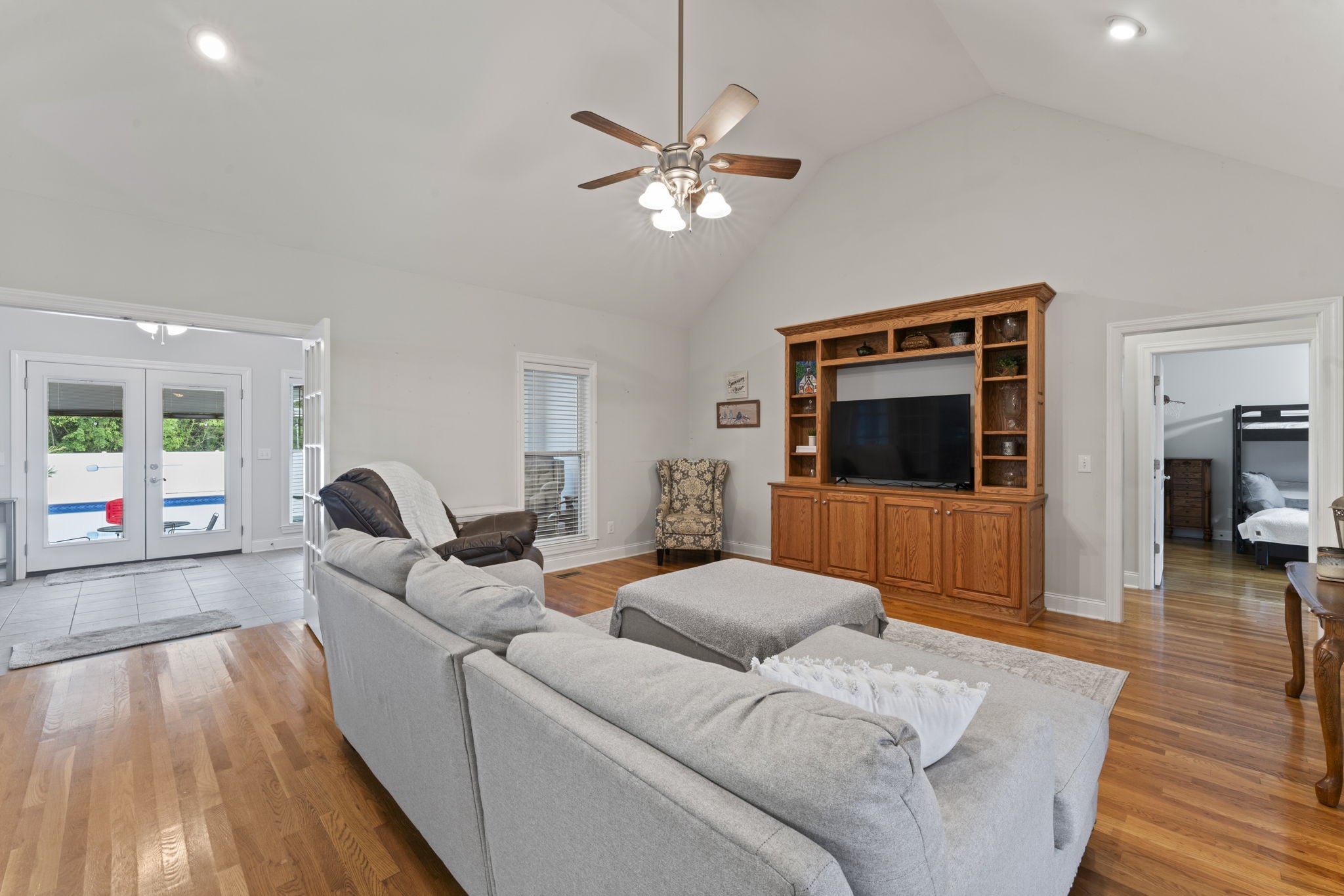 11237 Newtown Road Unionville, TN 37180 - Photo 5 of 46 a living room with furniture and a flat screen tv