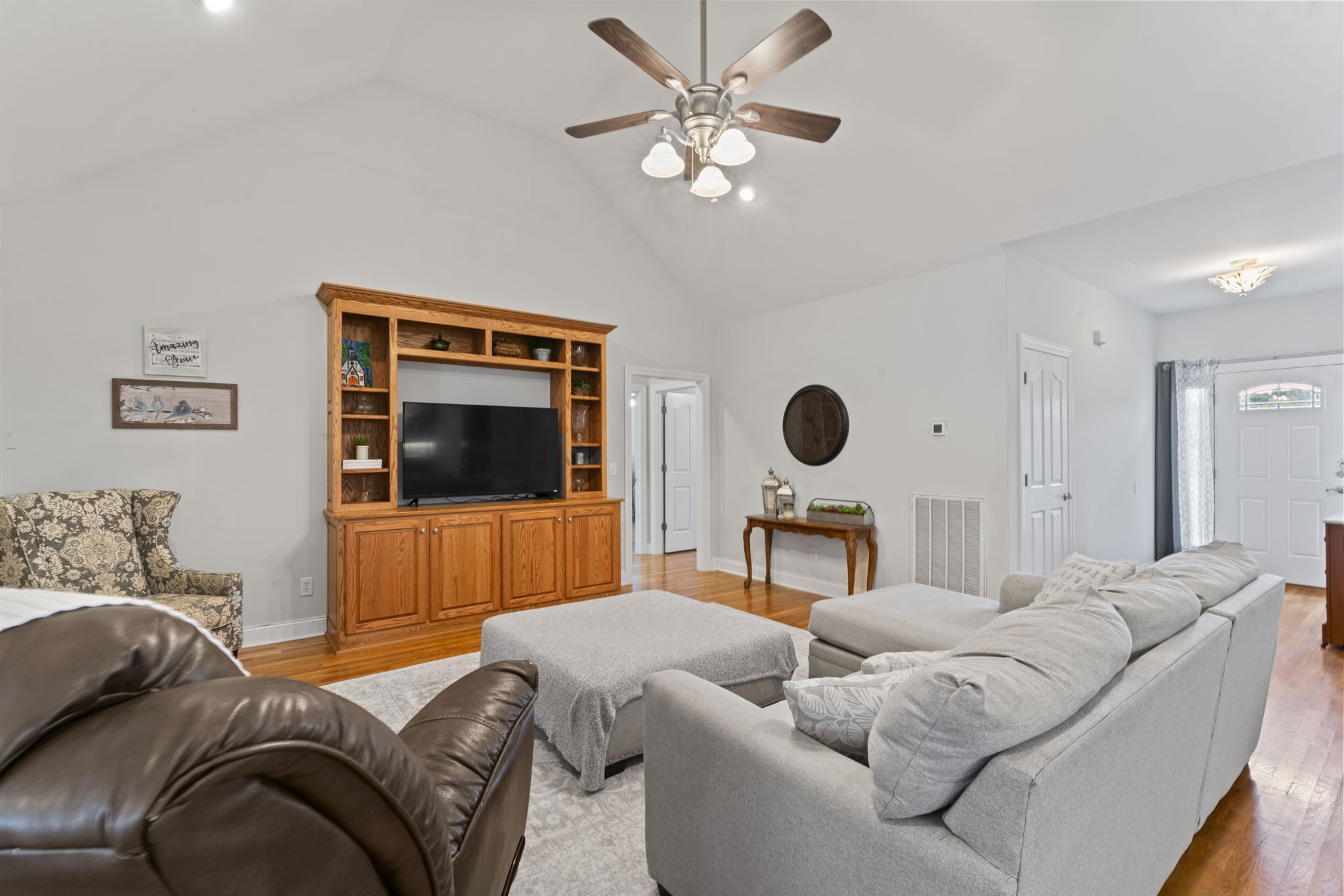 11237 Newtown Road Unionville, TN 37180 - Photo 6 of 46 a living room with furniture and a flat screen tv