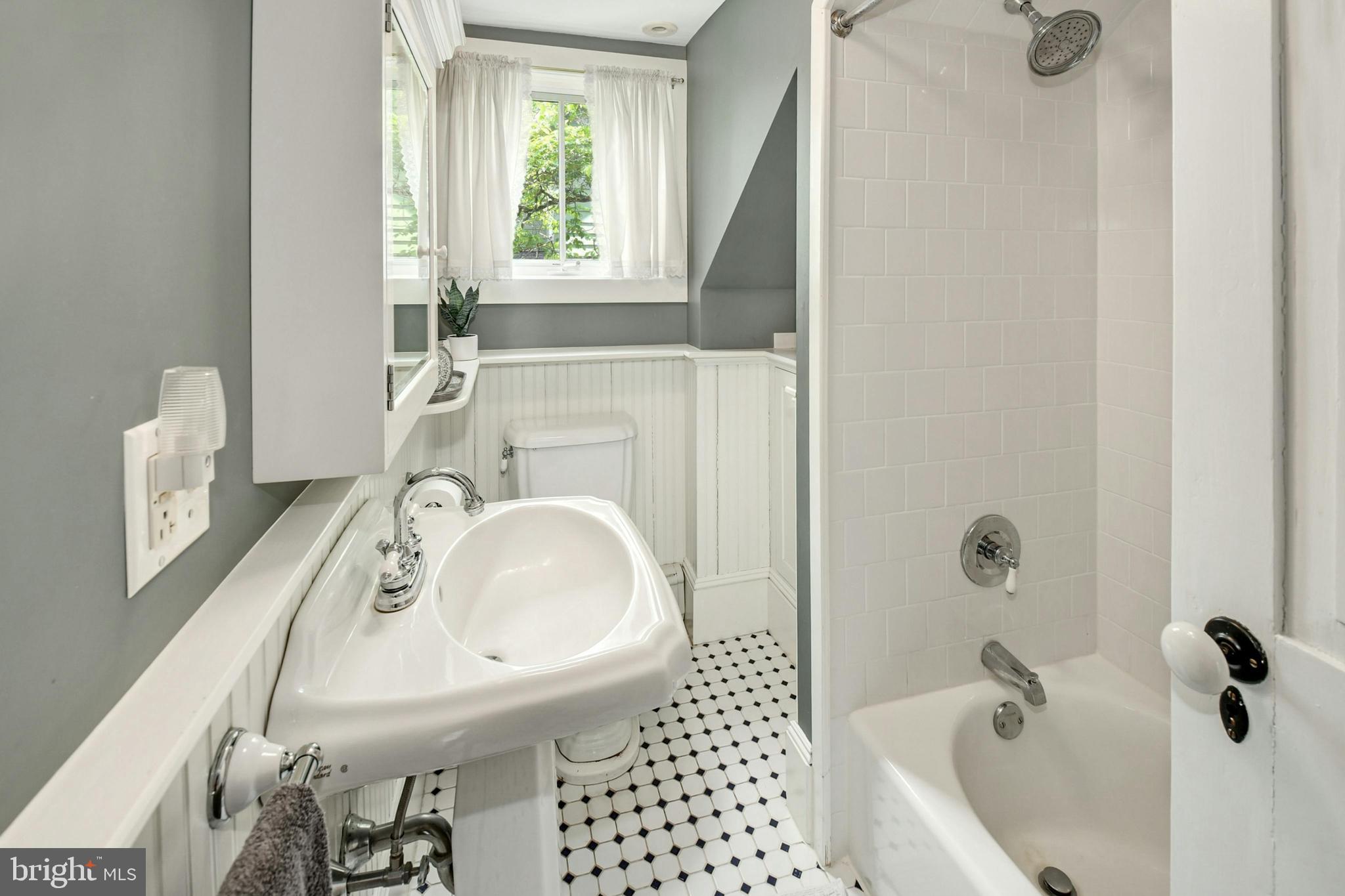 155 Old Philadelphia Road Riegelsville, PA 18077 - Photo 21 of 42 a bathroom with a sink a toilet and shower