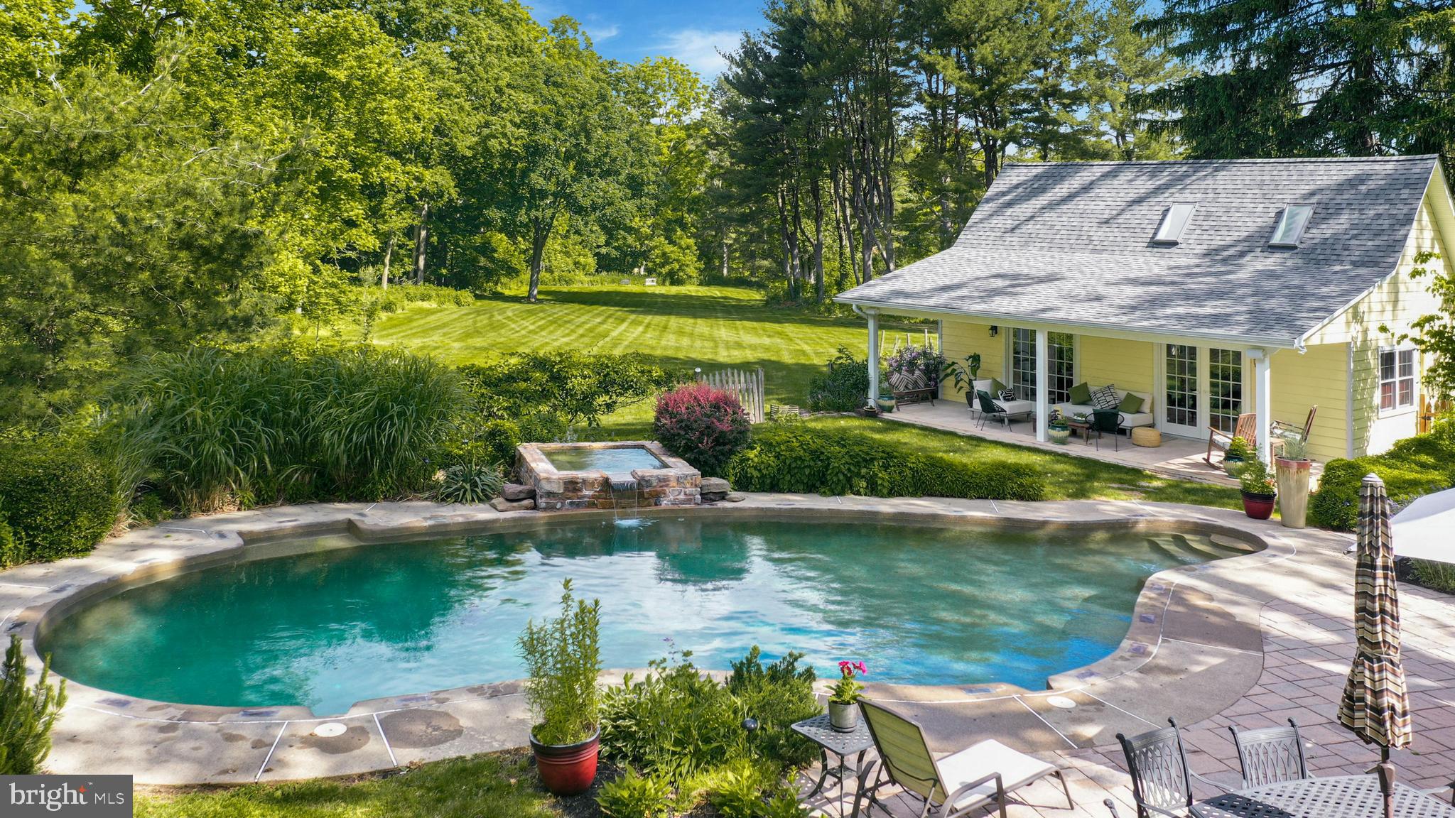 155 Old Philadelphia Road Riegelsville, PA 18077 - Photo 26 of 42 a view of a house with a yard and potted plants