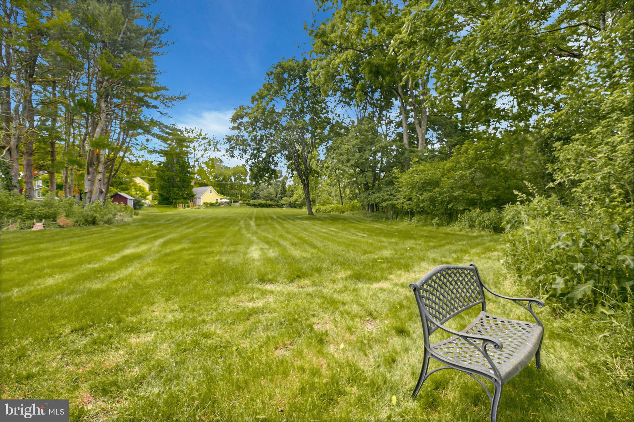 155 Old Philadelphia Road Riegelsville, PA 18077 - Photo 38 of 42 a view of a swimming pool with lawn chairs and a yard