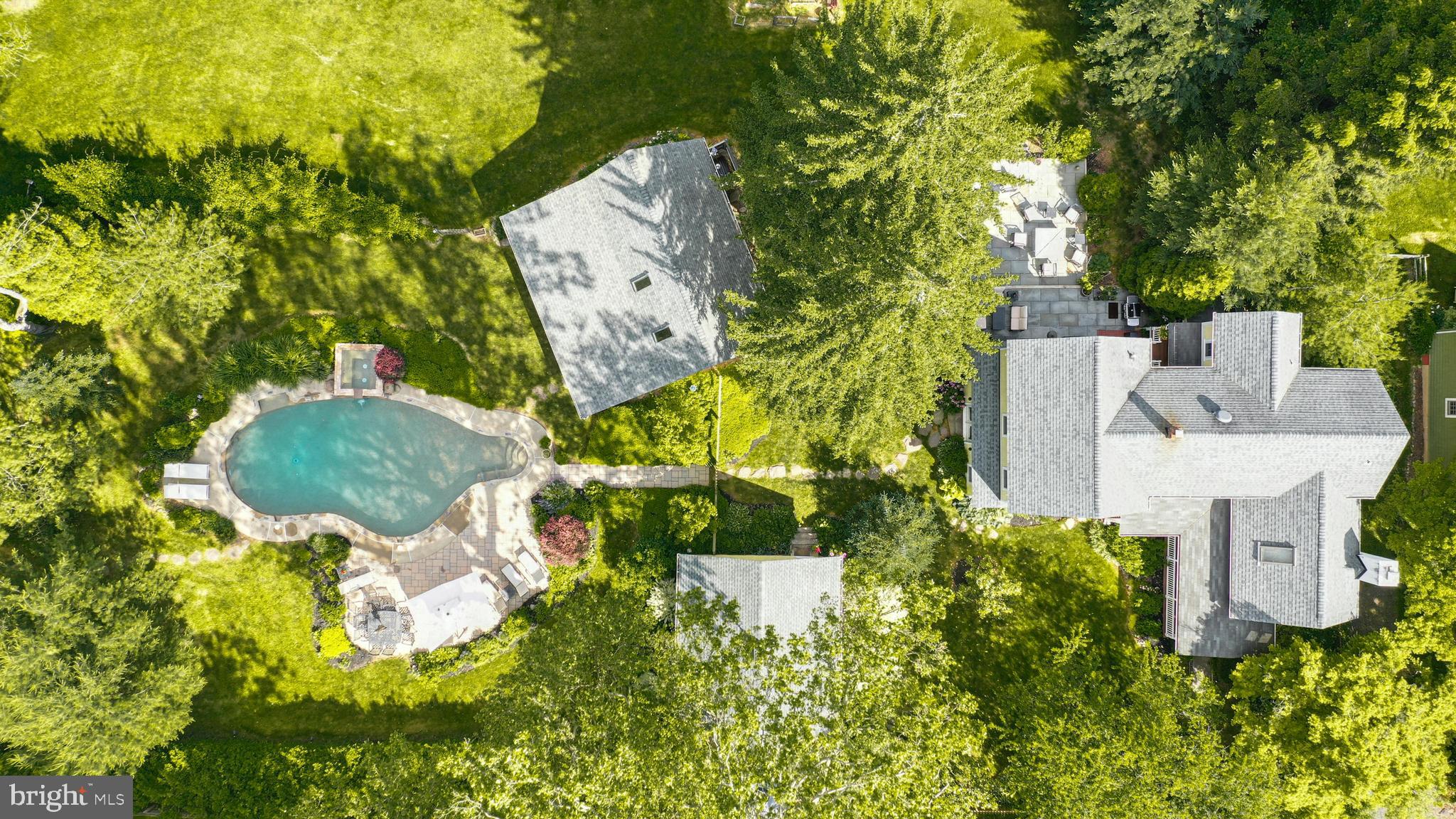 155 Old Philadelphia Road Riegelsville, PA 18077 - Photo 40 of 42 an aerial view of a house with a yard and large trees