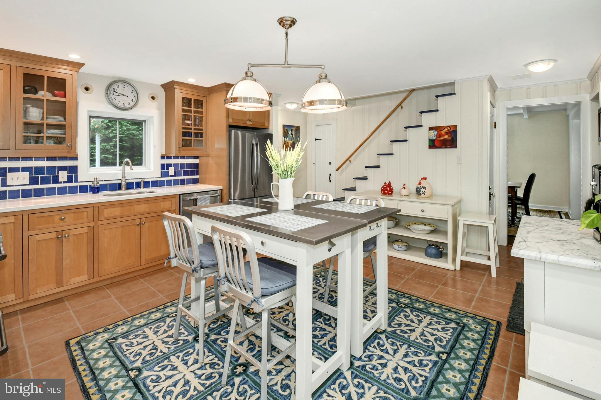 155 Old Philadelphia Road Riegelsville, PA 18077 - Photo 8 of 42 a open dining room with wooden floor and white walls
