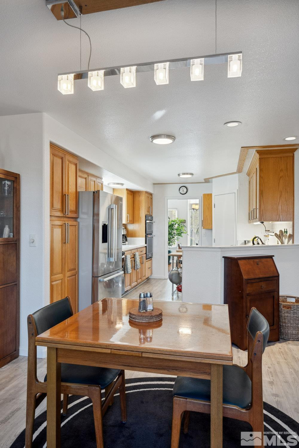 6238 Golden Meadow Road Reno, NV 89519 - Photo 24 of 40 a view of a dining room with furniture