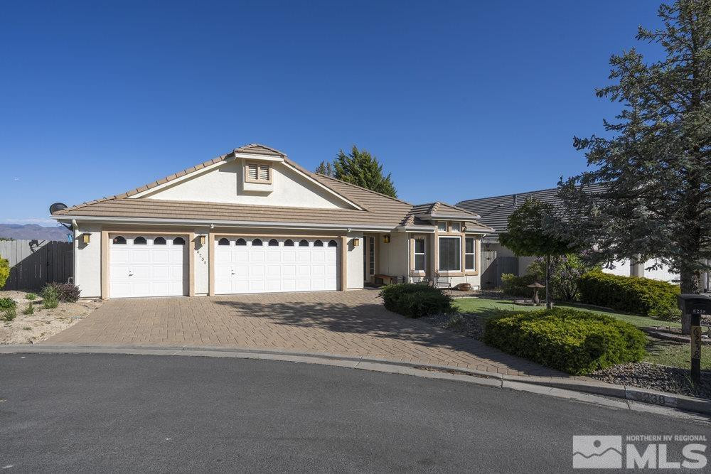 6238 Golden Meadow Road Reno, NV 89519 - Photo 37 of 40 a front view of a house with a yard