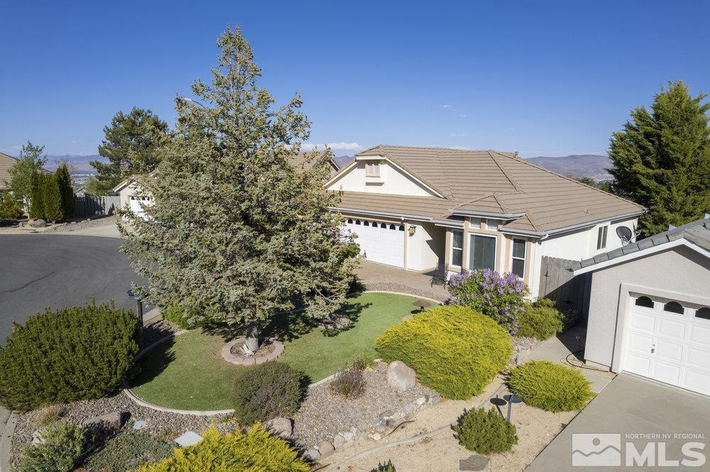 6238 Golden Meadow Road Reno, NV 89519 - Photo 38 of 40 front view of a house with a yard