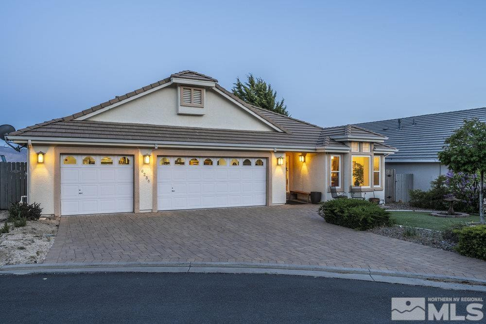 6238 Golden Meadow Road Reno, NV 89519 - Photo 40 of 40 a front view of a house with a yard and garage