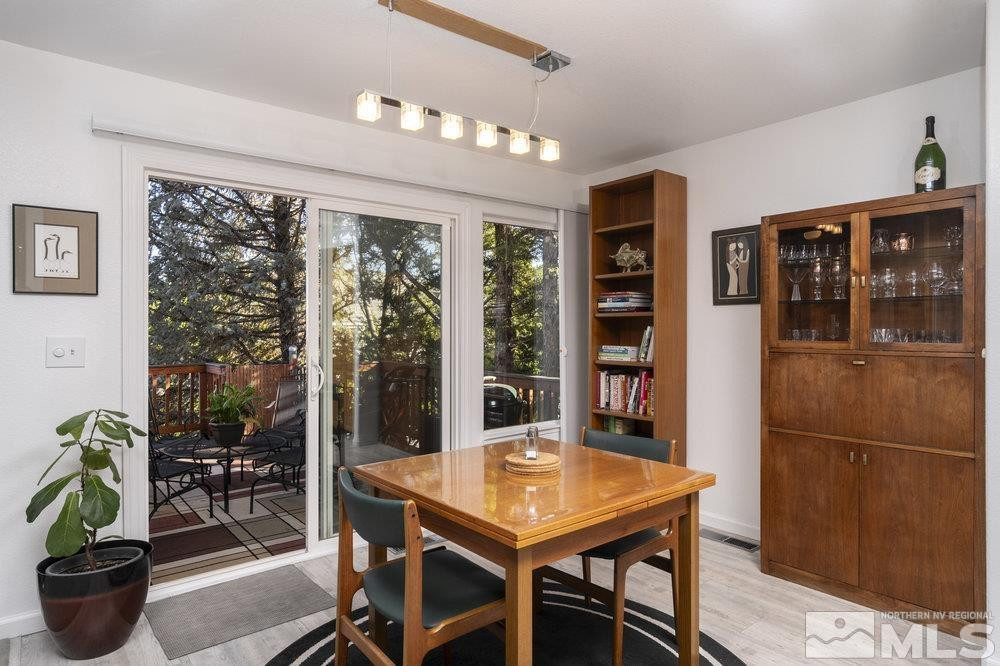 6238 Golden Meadow Road Reno, NV 89519 - Photo 8 of 40 a view of a dining room with furniture window and outside view