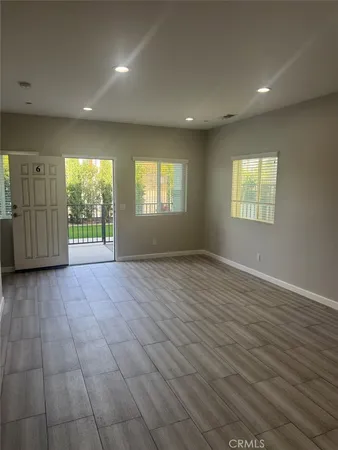 a kitchen with stainless steel appliances granite countertop a sink a stove a microwave and cabinets