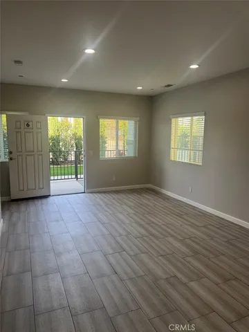 a kitchen with stainless steel appliances granite countertop a sink a stove a microwave and cabinets