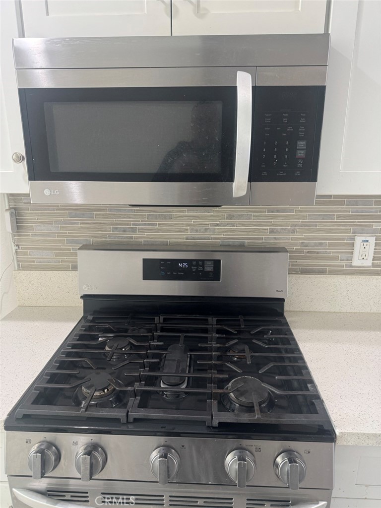 13665 Arrow Route, Unit 6 Fontana, CA 92335 - Photo 19 of 42 a close view of stove