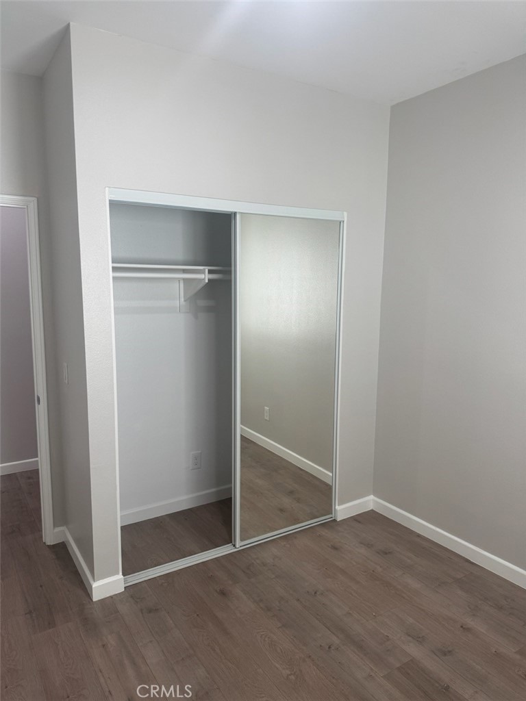 13665 Arrow Route, Unit 6 Fontana, CA 92335 - Photo 29 of 42 an empty room with closet area