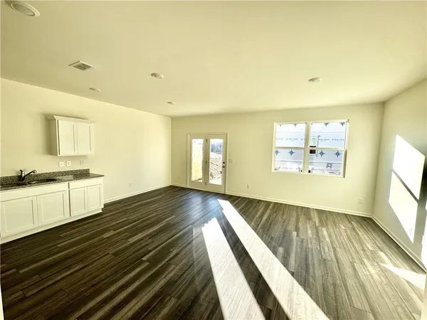 a view of an empty room and window