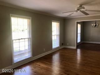 11 Bolingview Road Juliette, GA 31046 - Photo 2 of 14 a view of an empty room with wooden floor and a window