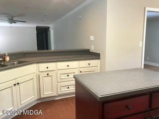 11 Bolingview Road Juliette, GA 31046 - Photo 5 of 14 a kitchen with granite countertop white cabinets and white appliances