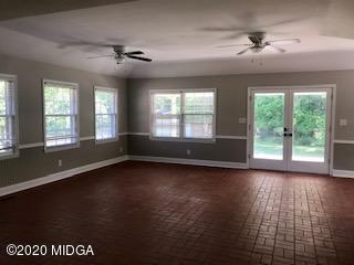 11 Bolingview Road Juliette, GA 31046 - Photo 6 of 14 a view of an empty room with wooden floor and a window