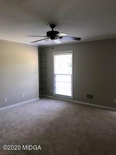 11 Bolingview Road Juliette, GA 31046 - Photo 8 of 14 an empty room with a window and a ceiling fan