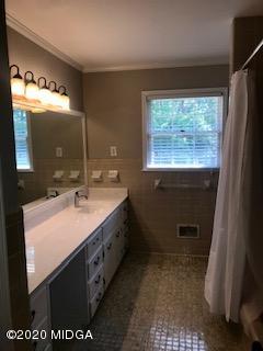 11 Bolingview Road Juliette, GA 31046 - Photo 10 of 14 a bathroom with a sink a vanity and a mirror
