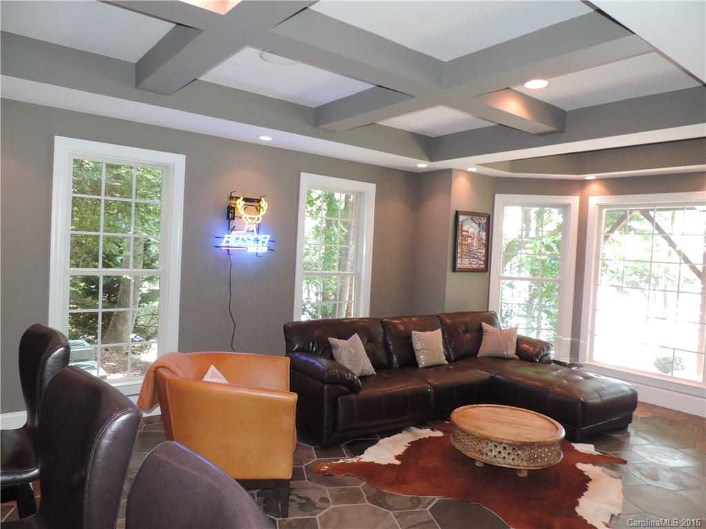 5516 Plantation Ridge Road Charlotte, NC 28214 - Photo 17 of 24 a living room with furniture and a large window