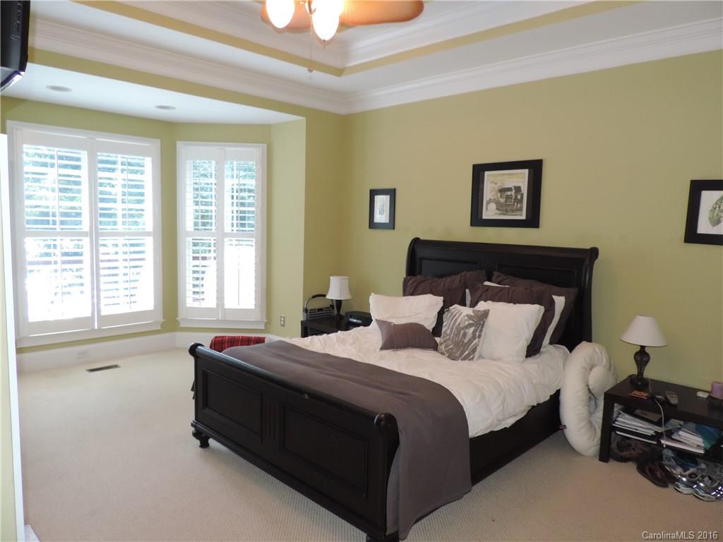 5516 Plantation Ridge Road Charlotte, NC 28214 - Photo 20 of 24 a bedroom with a bed and a window
