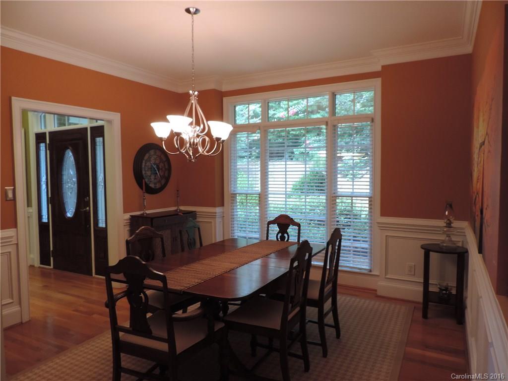 5516 Plantation Ridge Road Charlotte, NC 28214 - Photo 3 of 24 a view of a dining room with furniture window and wooden floor