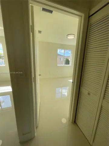 a bathroom with a mirror