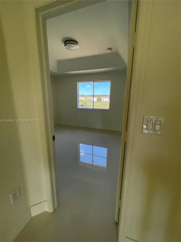 a view of swimming pool with outdoor space and lake view