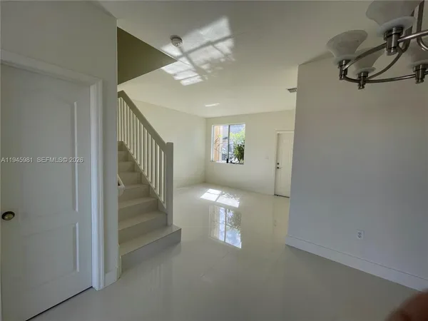 a view of a lake with a city