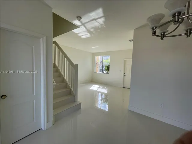 a view of a lake with a city