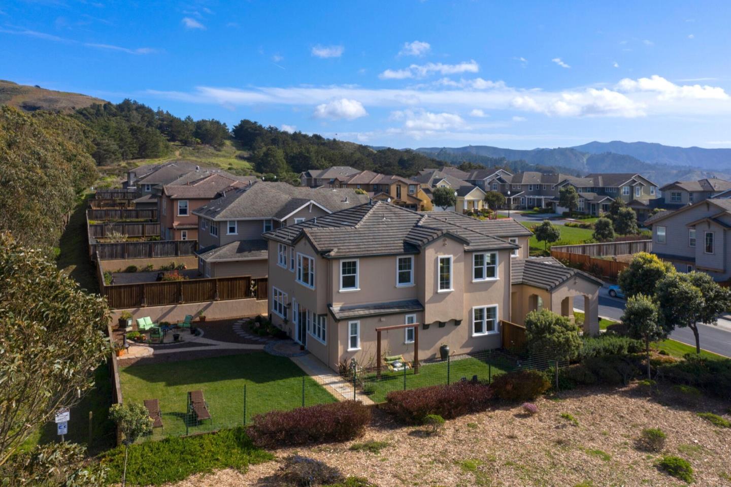 1 Connemara Drive Pacifica, CA 94044 - Photo 2 of 45 an aerial view of a house with a garden