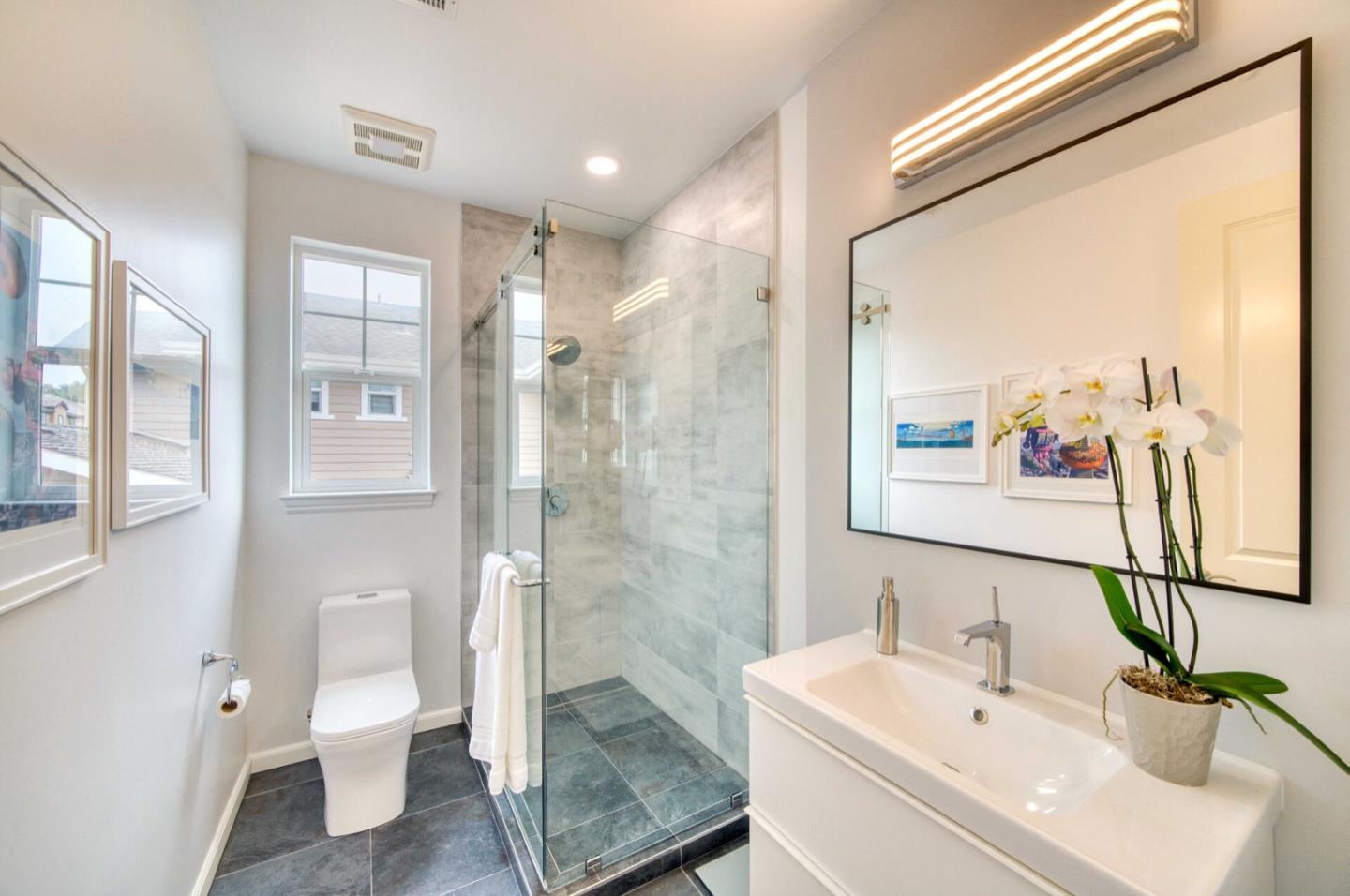 1 Connemara Drive Pacifica, CA 94044 - Photo 21 of 45 a bathroom with a sink a toilet and shower