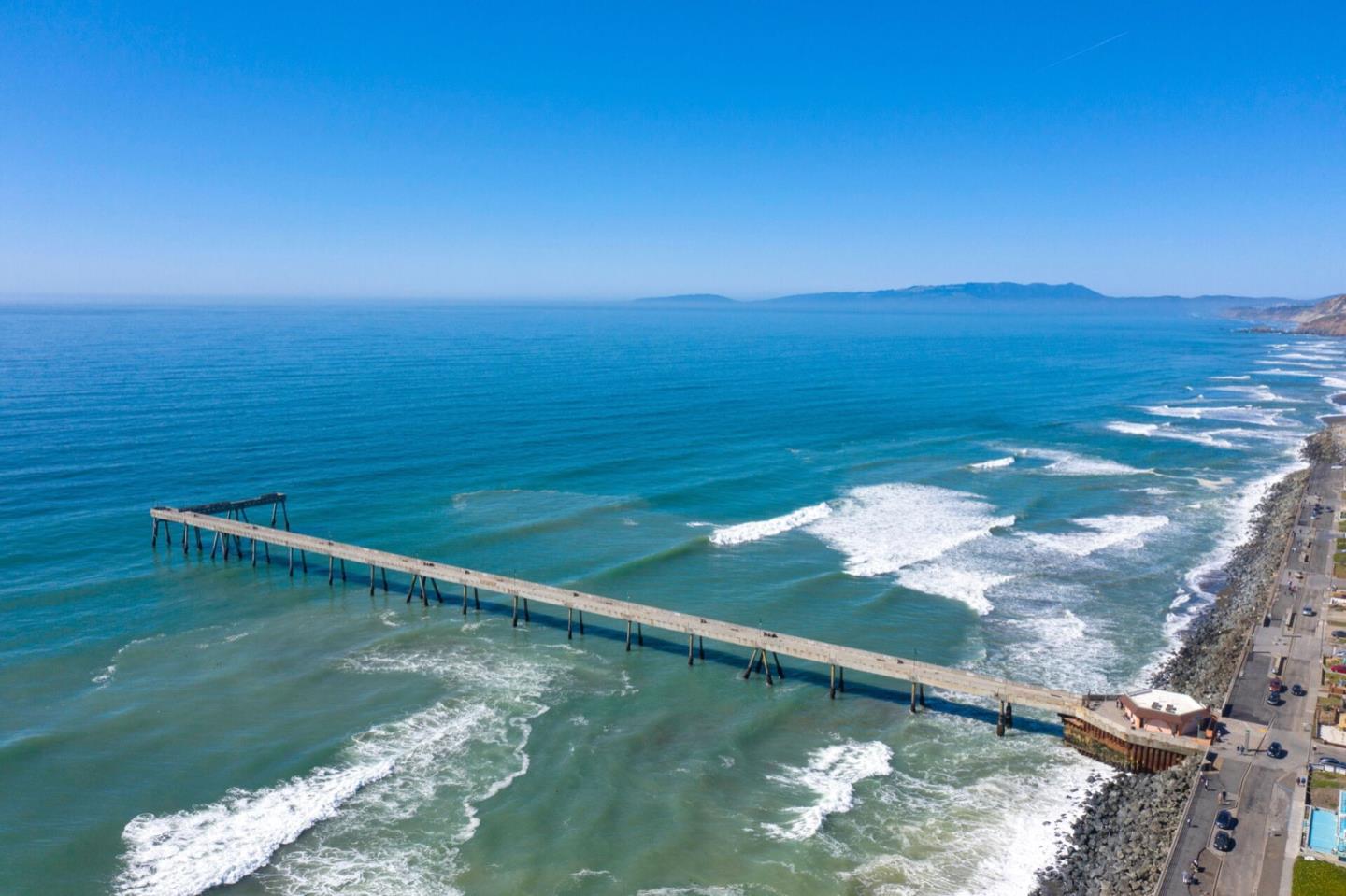 1 Connemara Drive Pacifica, CA 94044 - Photo 30 of 45 a view of an ocean from a balcony