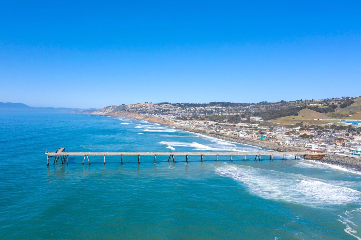 1 Connemara Drive Pacifica, CA 94044 - Photo 31 of 45 a view of an ocean and beach