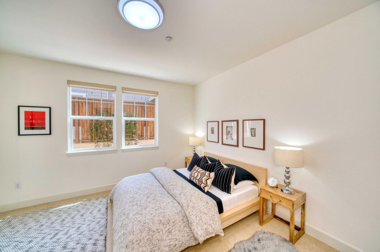 1 Connemara Drive Pacifica, CA 94044 - Photo 5 of 45 a bedroom with a bed and a window