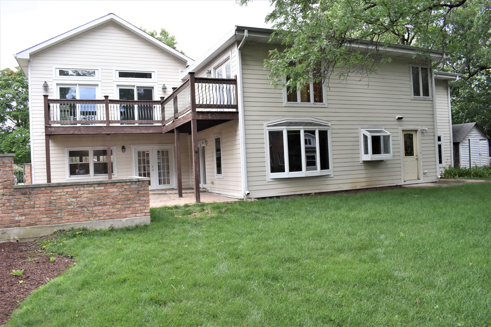 1441 Potter Road Park Ridge, IL 60068 - Photo 3 of 33 a front view of a house with a yard
