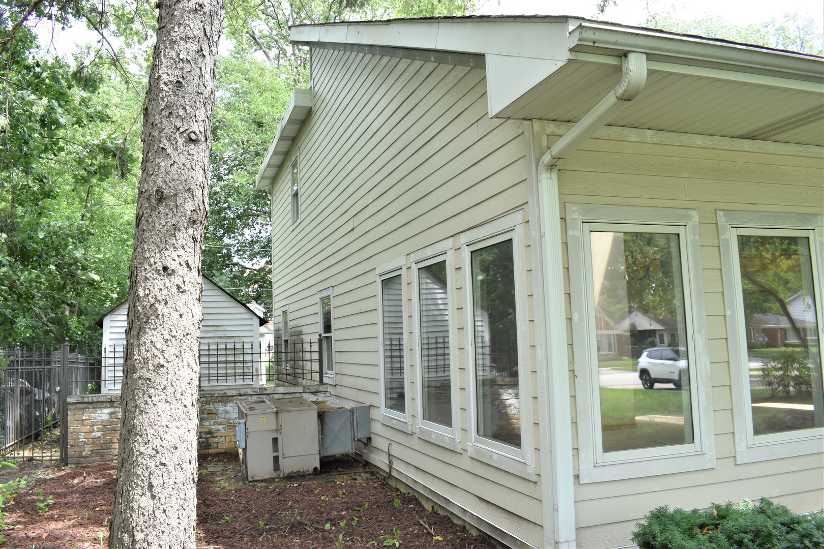 1441 Potter Road Park Ridge, IL 60068 - Photo 5 of 33 a view of a porch with a table and chairs