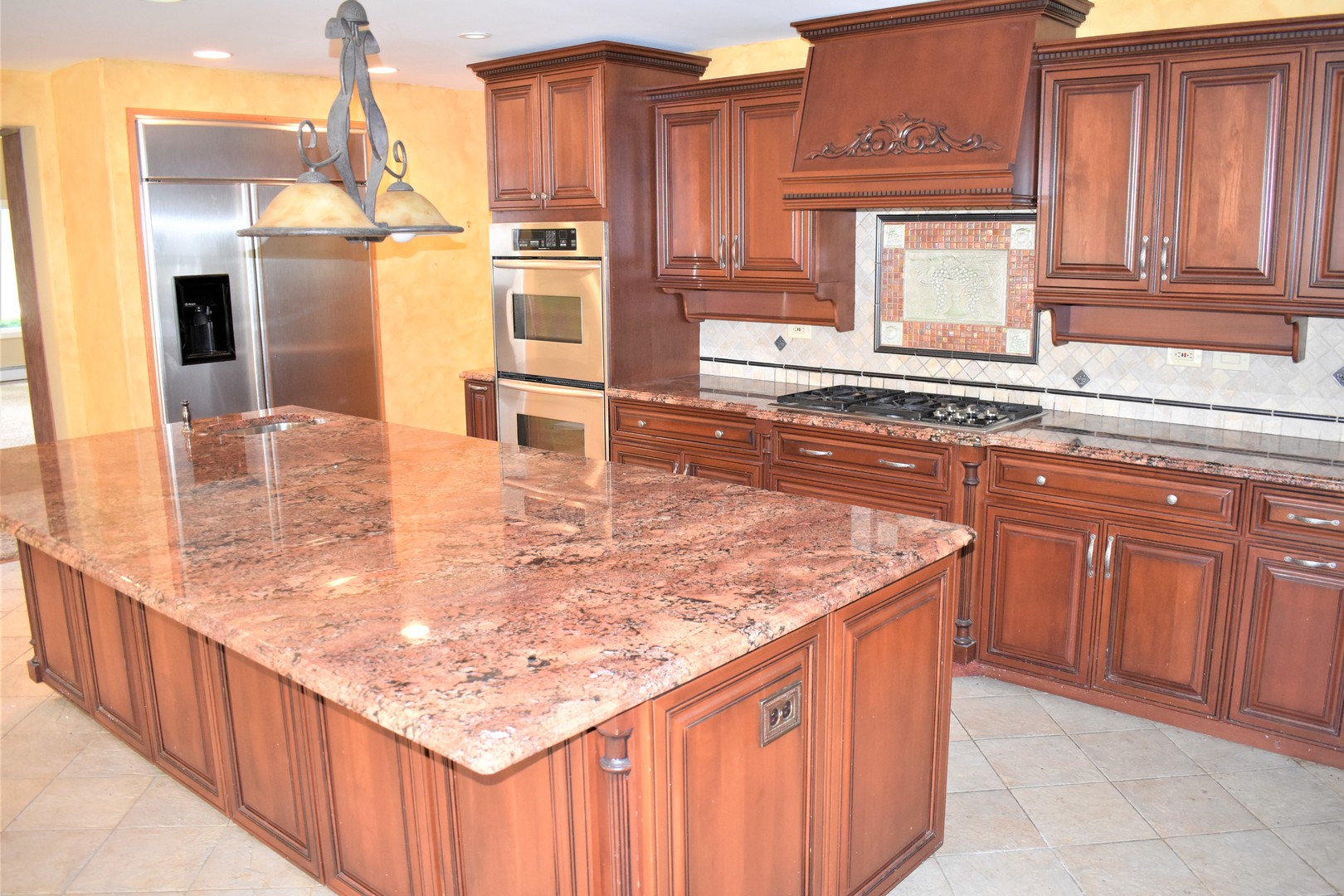 1441 Potter Road Park Ridge, IL 60068 - Photo 7 of 33 a kitchen with stainless steel appliances granite countertop a sink and cabinets