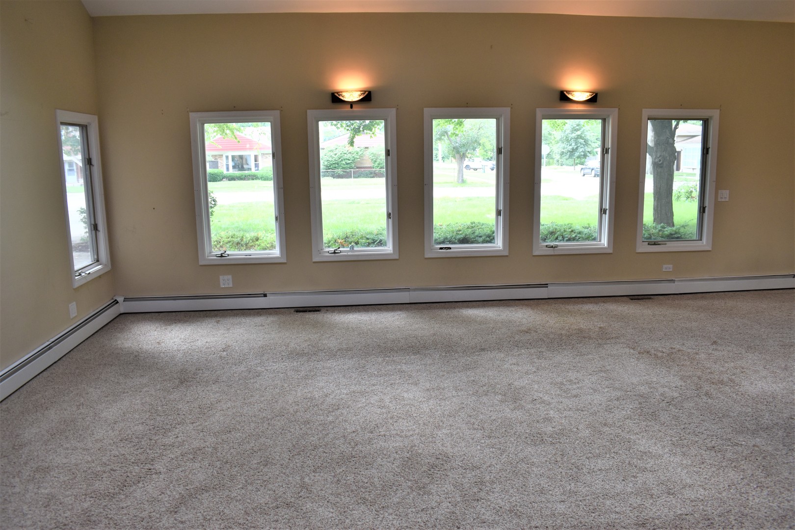 1441 Potter Road Park Ridge, IL 60068 - Photo 10 of 33 an empty room with windows and outdoor view