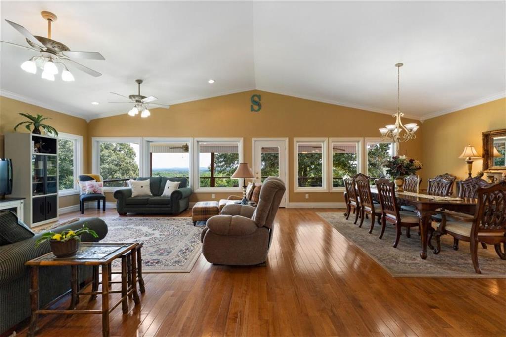 300 Ellis Road Southeast Rome, GA 30161 - Photo 13 of 46 a view of a dining room with furniture window and wooden floor